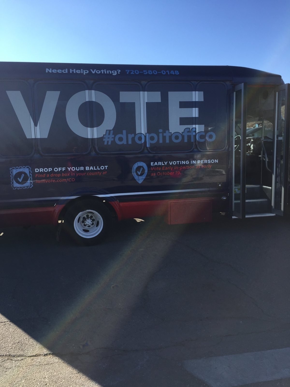 A picture of a voting advertisement on a truck at a Get Out the Vote Event